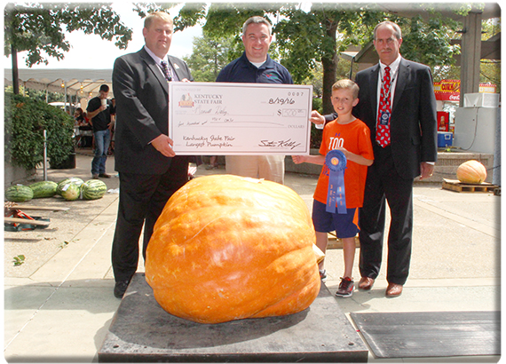 Maxwell Daley wins the $500 largest pumpkin prize.